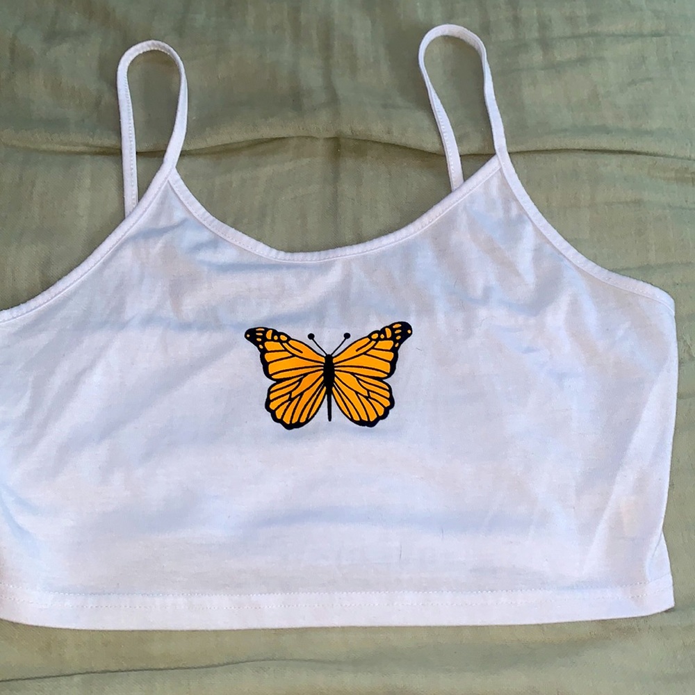 It’s a white butterfly tank top from shein in a M